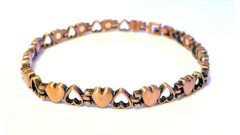 Tobillera antigua con corazones de cobre