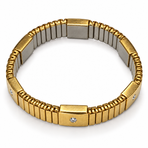 Pulsera dorada con cristales exteriores e interior metálico