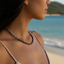 Fair Skin Woman Black Pearl Necklace Beach