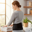 Person Wearing Magnetic Back Belt During House Chores